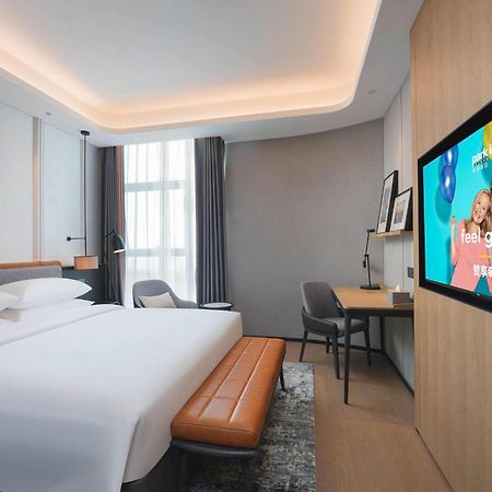 Park Inn By Radisson Nanchong Yilong Star City Plaza Exterior foto