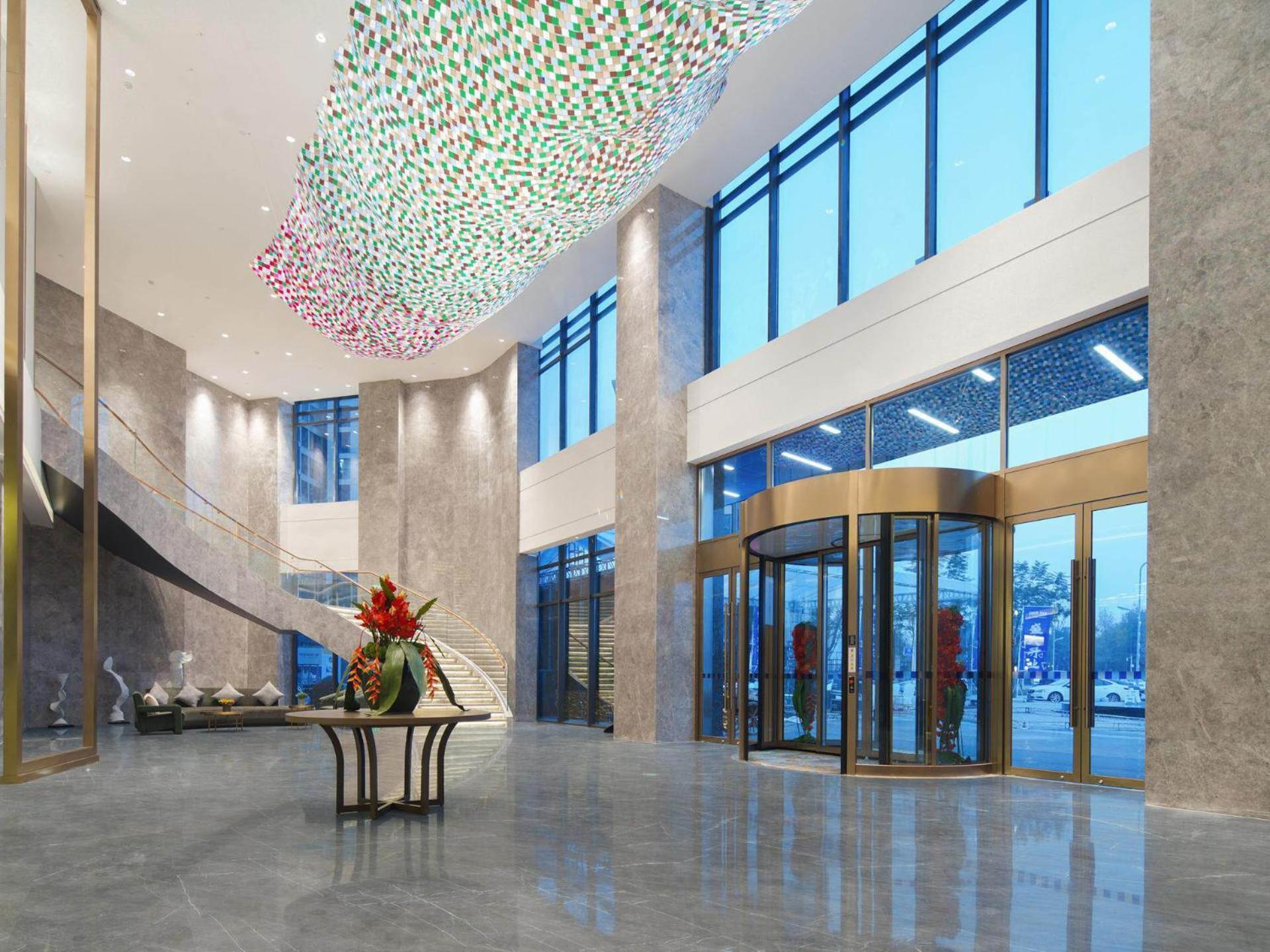 Park Inn By Radisson Nanchong Yilong Star City Plaza Exterior foto