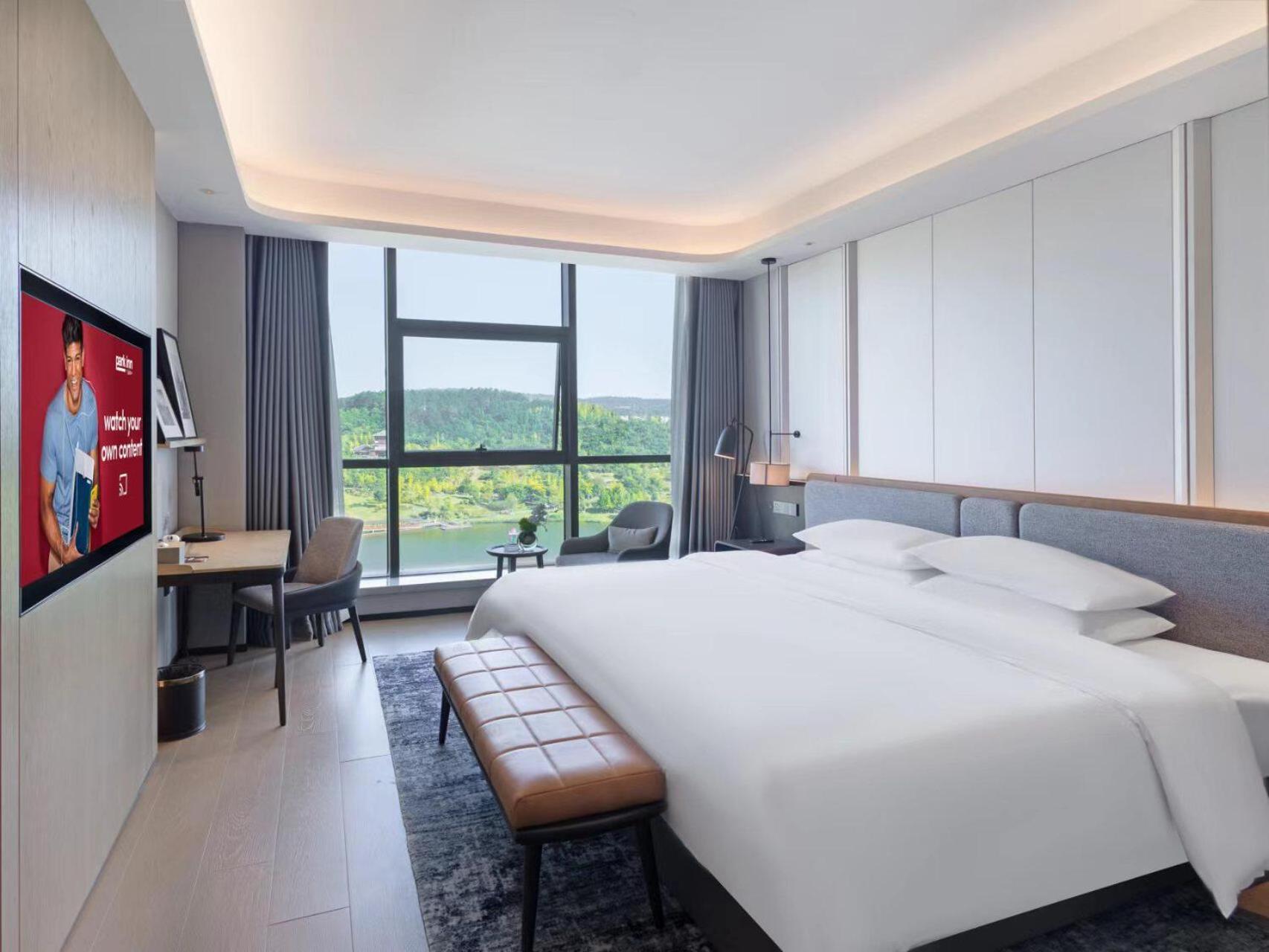 Park Inn By Radisson Nanchong Yilong Star City Plaza Exterior foto