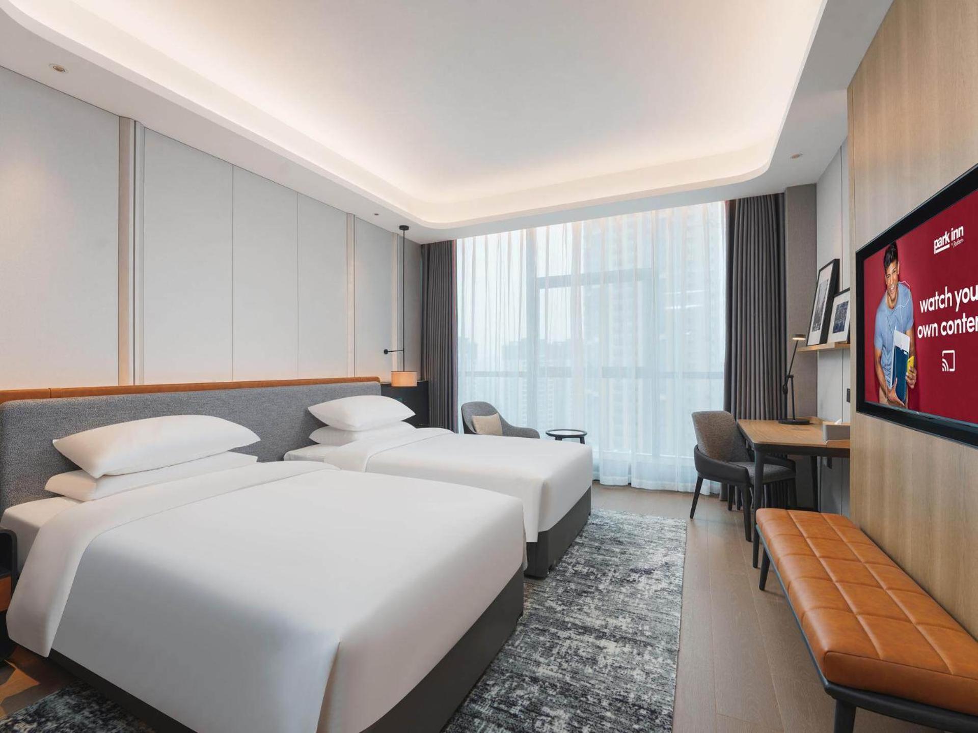 Park Inn By Radisson Nanchong Yilong Star City Plaza Exterior foto
