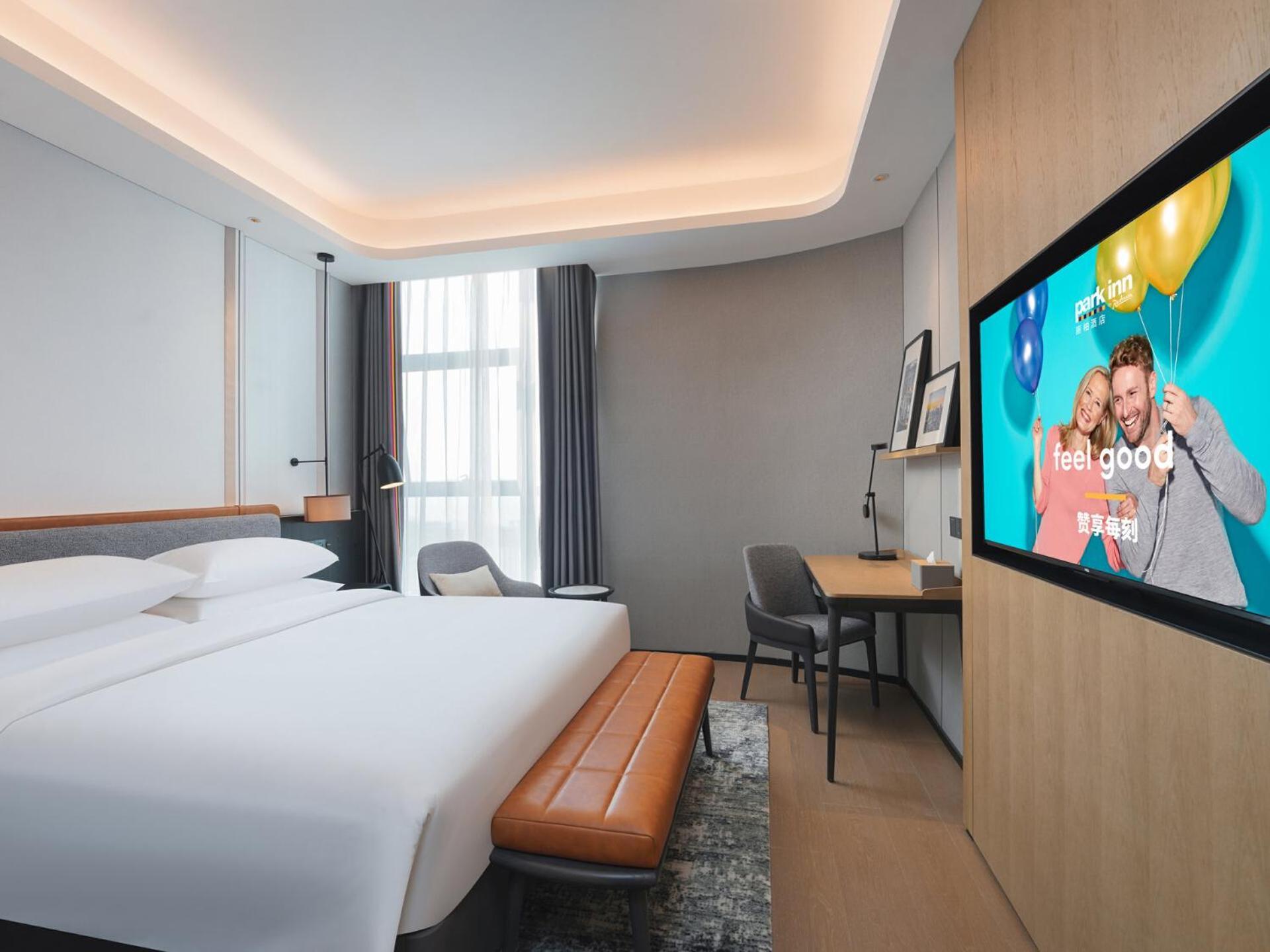Park Inn By Radisson Nanchong Yilong Star City Plaza Exterior foto