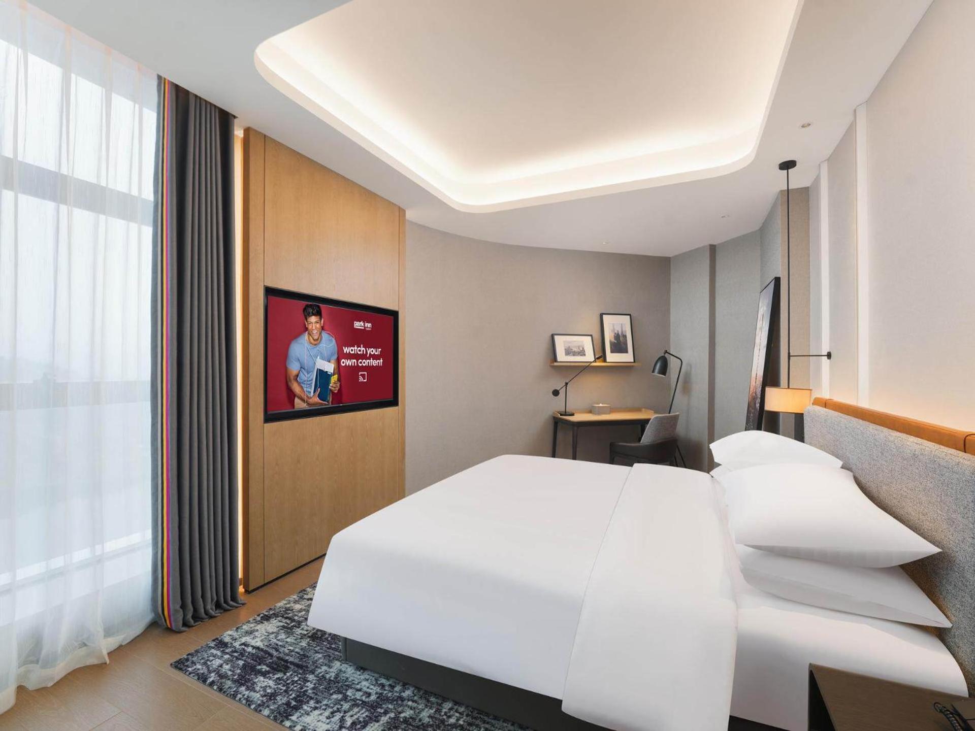 Park Inn By Radisson Nanchong Yilong Star City Plaza Exterior foto