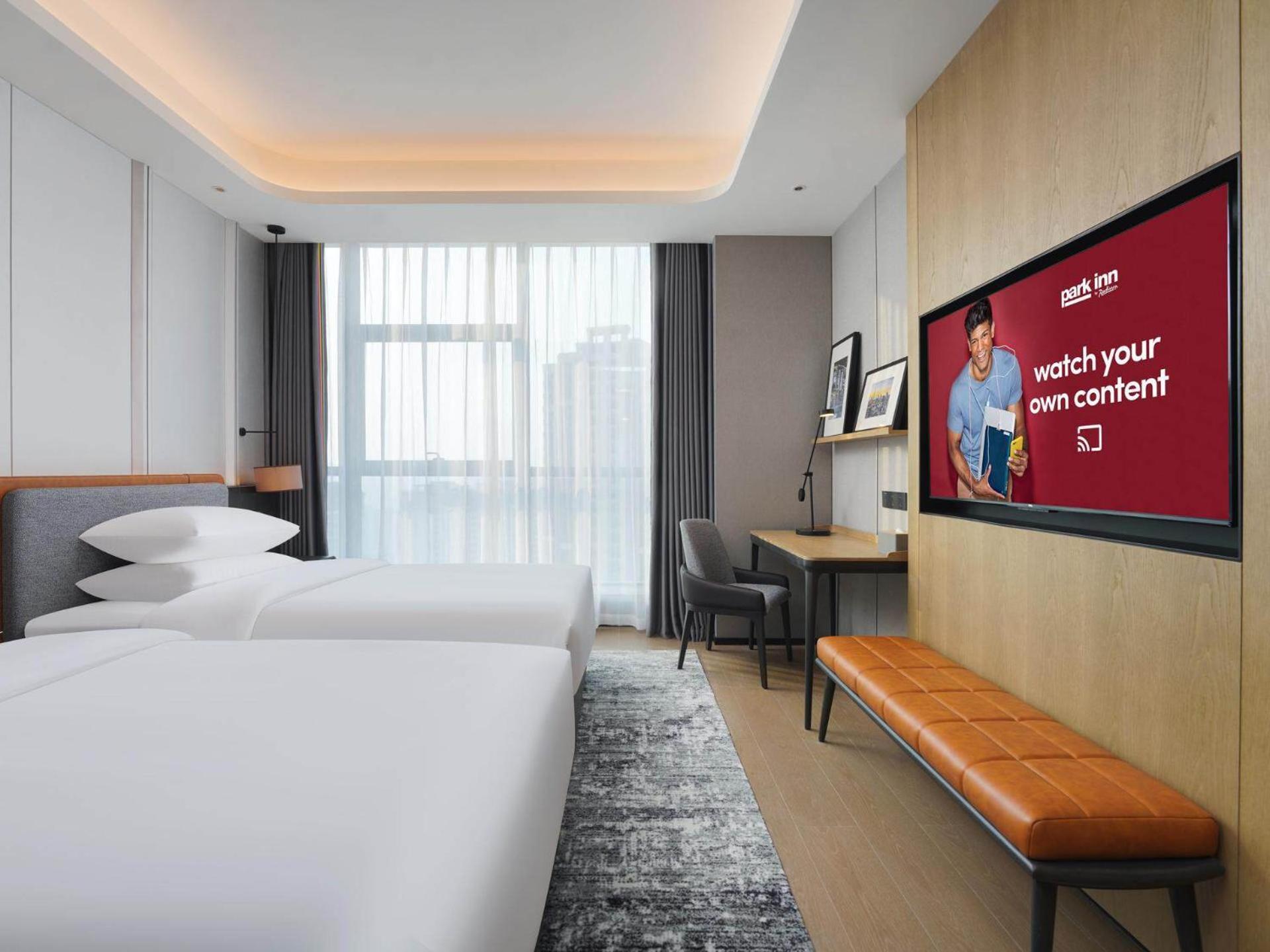 Park Inn By Radisson Nanchong Yilong Star City Plaza Exterior foto