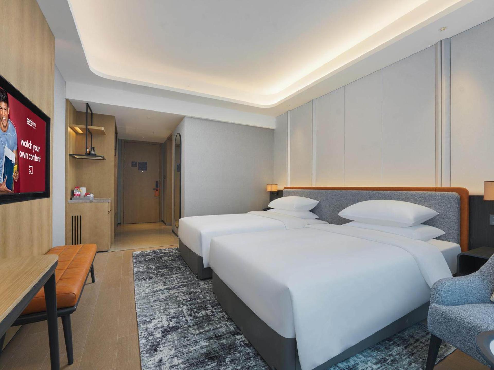 Park Inn By Radisson Nanchong Yilong Star City Plaza Exterior foto